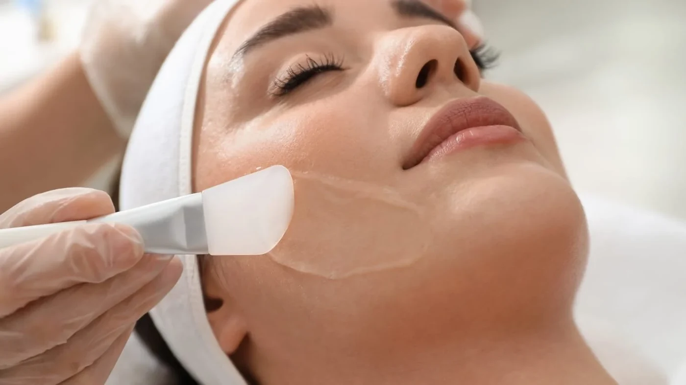 Chemical peel solution applied evenly across the cheek and jawline during treatment at Aeconic Clinic, Canggu, Bali